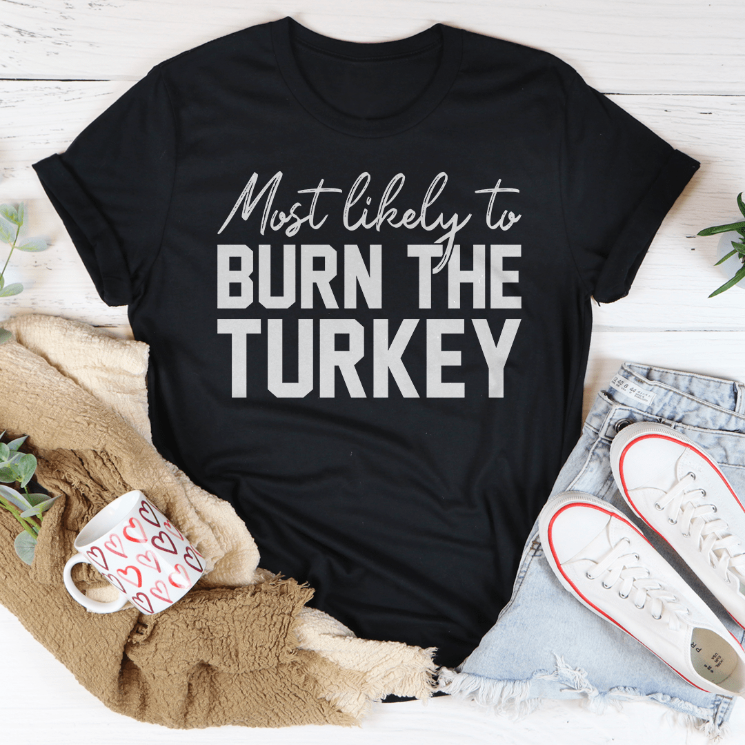 Most Likely To Burn The Turkey Thanksgiving Tee shopmerchmallow Most Likely To Burn The Turkey Thanksgiving Tee