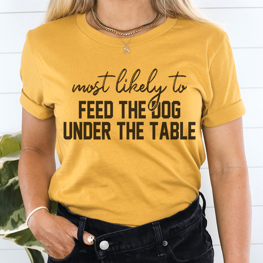 Most Likely To Feed The Dog Under The Table Thanksgiving Tee shopmerchmallow Most Likely To Feed The Dog Under The Table Thanksgiving Tee