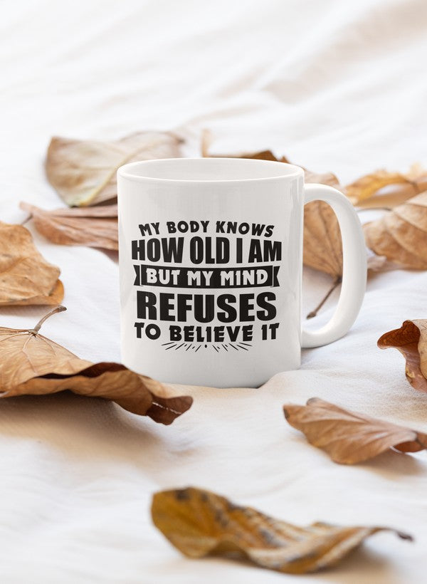 My Body Knows How Old I Am But My Mind Refuses to Believe It Mug shopmerchmallow Virgin Teez - A Future Wars Story Mug