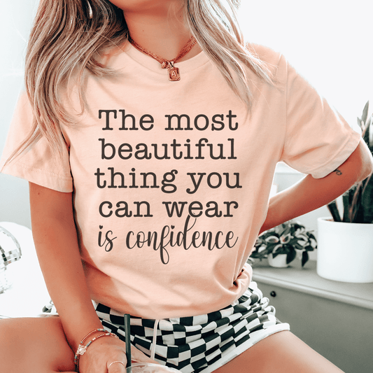The Most Beautiful Thing You Can Wear Is Confidence Tee shopmerchmallow The Most Beautiful Thing You Can Wear Is Confidence Tee