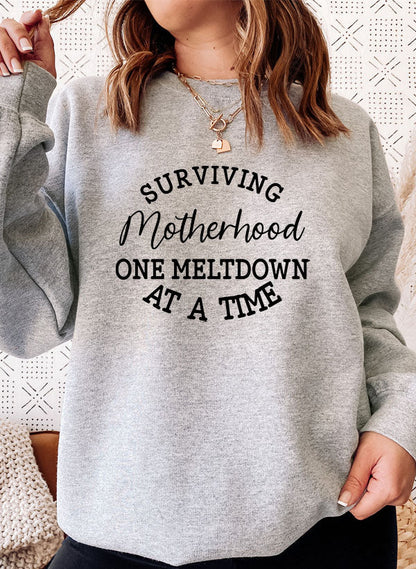 Surviving Motherhood Sweat Shirt