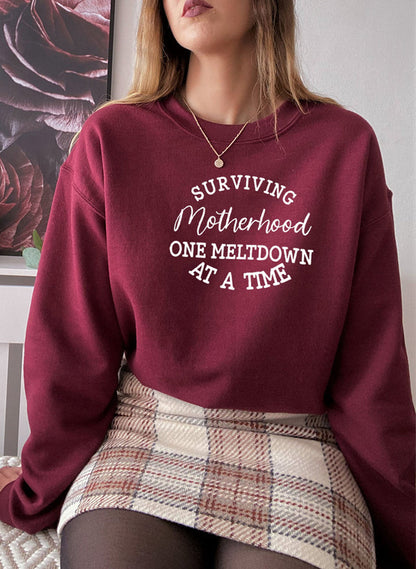 Surviving Motherhood Sweat Shirt